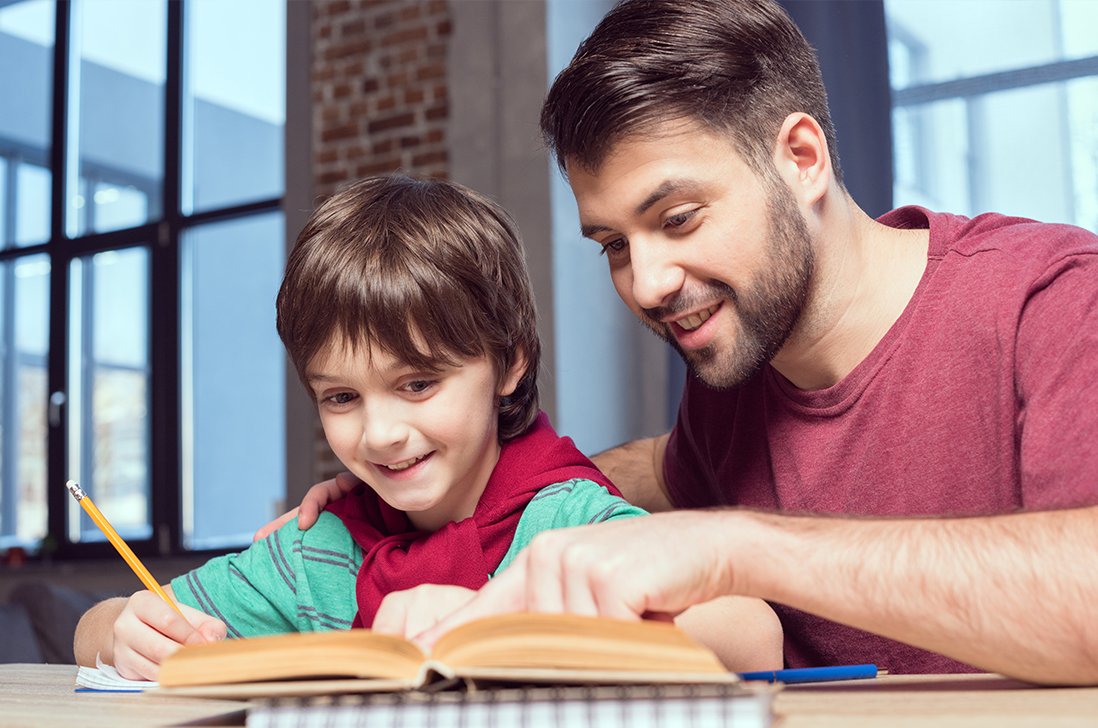 Dad helping kid with study